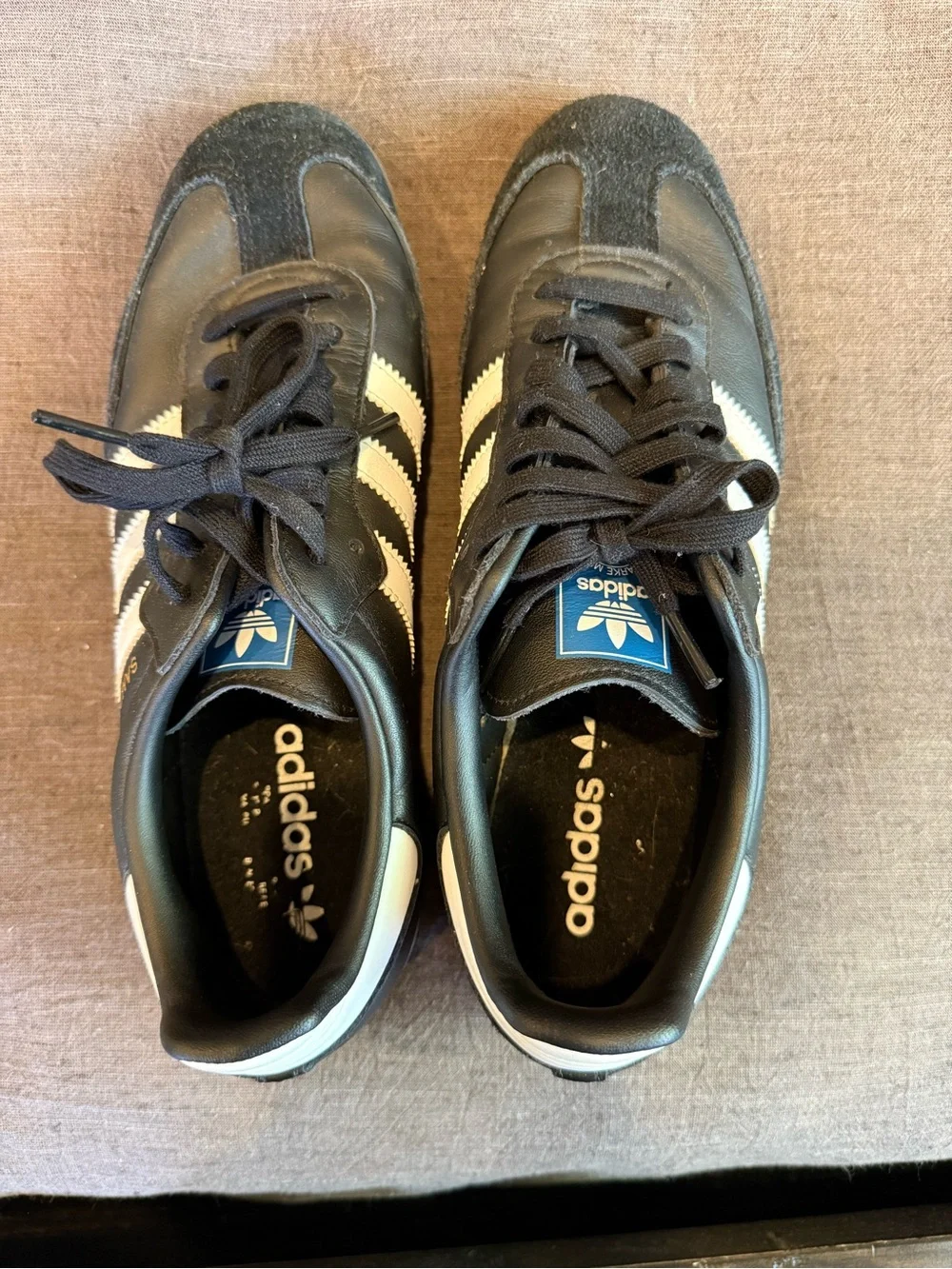 adidas Men’s Black Sneakers with White Stripes